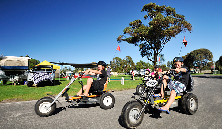 Kids riding on go karts in Lakes Entrance