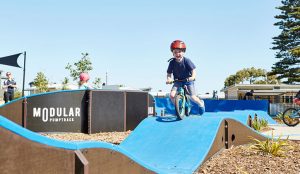 Young boy riding a bike on the pumptrack at Victor Harbor