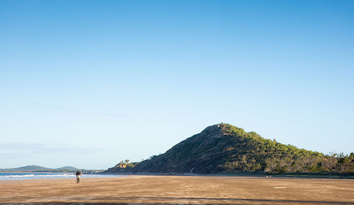 capricorn yeppoon beach with hill in the back