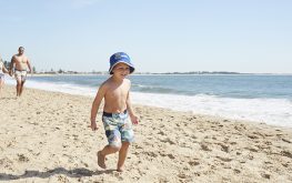 Stockton Beach child running near waves