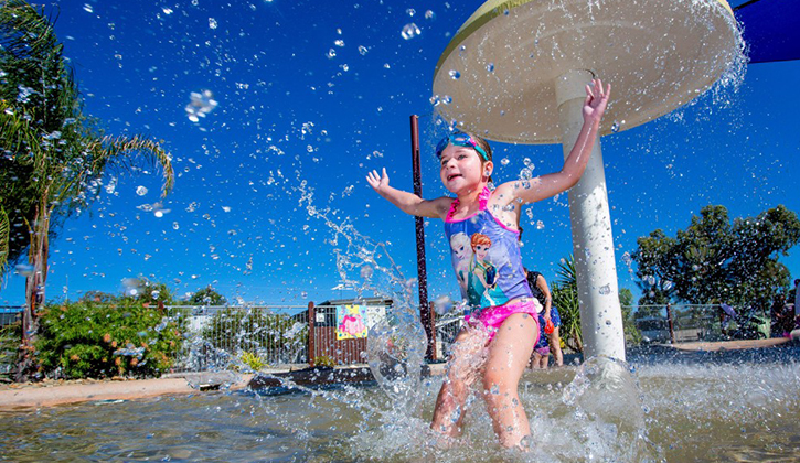 Girl playing in a waterpark in a Yarrawonga caravan park