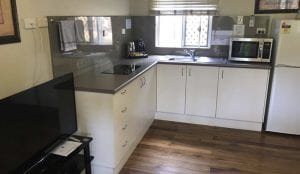 Atherton family cottage kitchen with appliances
