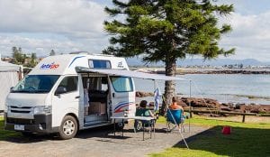 A couple in a campervan soaking up the views of Shellharbour
