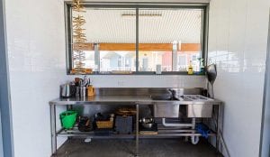 Indoor camp kitchen inside a Shellharbour holiday park