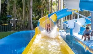 Girl riding the waterslide at the waterpark