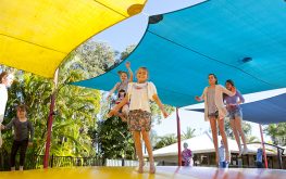 Kids jumping on a bouncing pillow at a Gold Coast Family Accommodation provider
